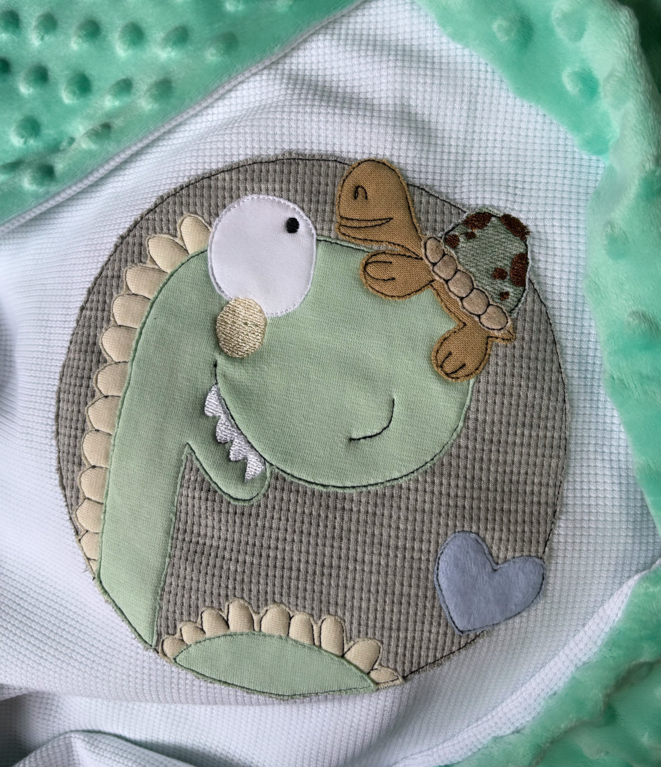 Stickdatei Dino und Schildi